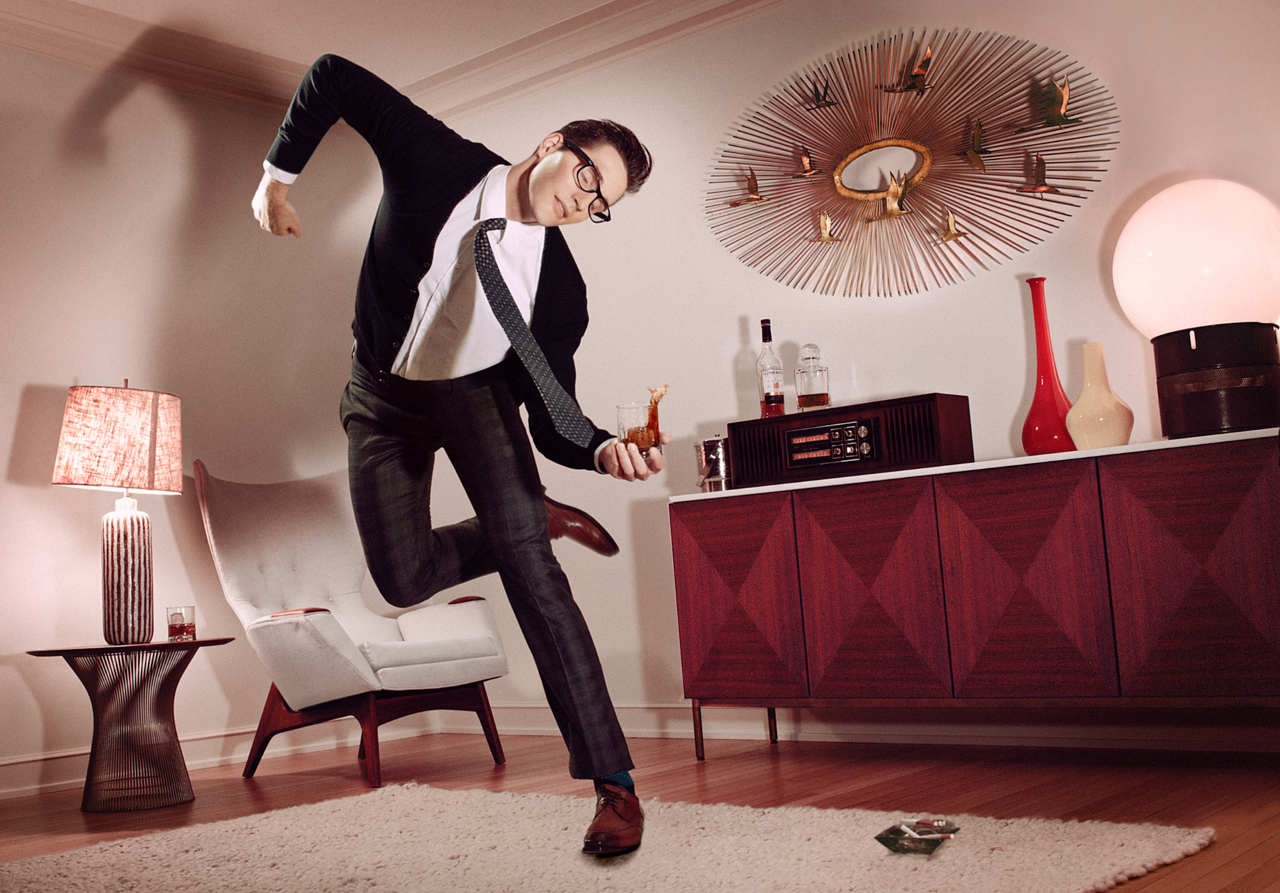 Mid centrury man dancing in living room | Conceptual Portrait by Saverio Truglia