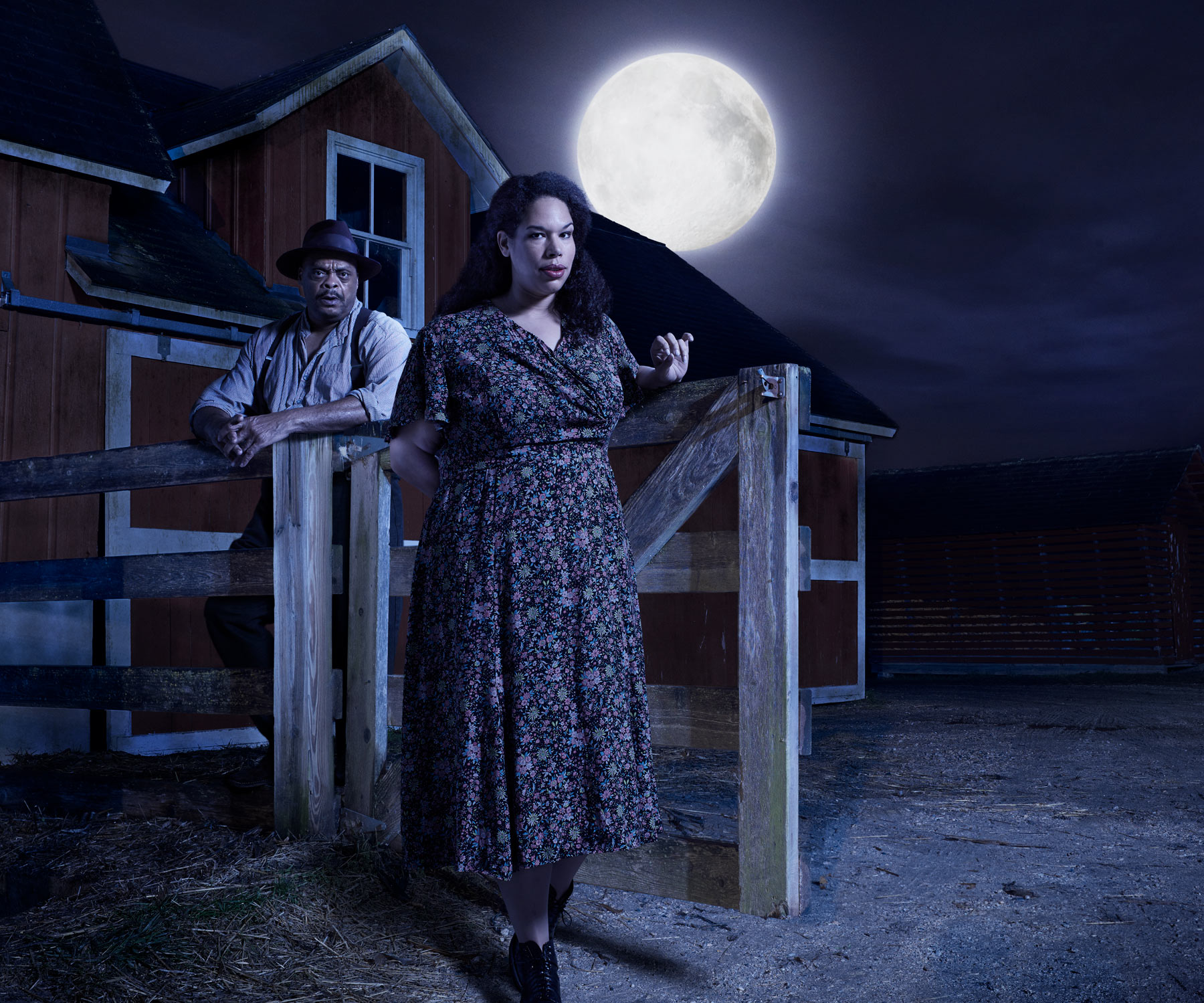 Woman and man on a farm at night under large moon | Conceptual portrait by Saverio Truglia