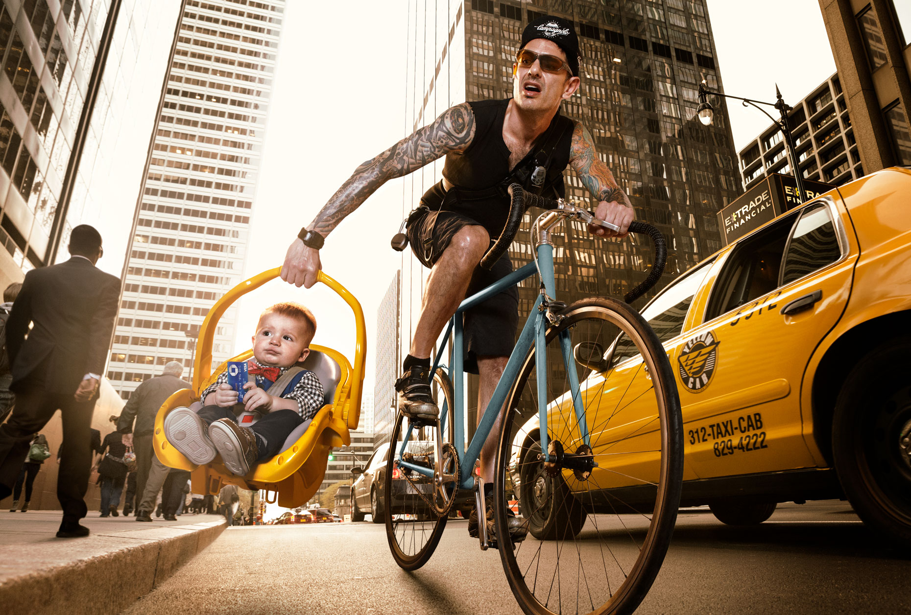 Baby being carried by bike messenger | Conceptual Portrait by Saverio Truglia