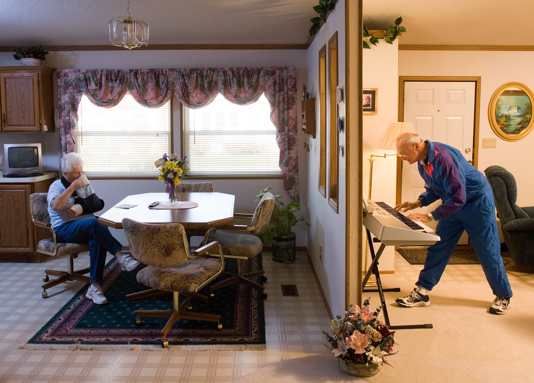 Senior citizen playing piano in mobile home | Conceptual Portait by Saverio Truglia