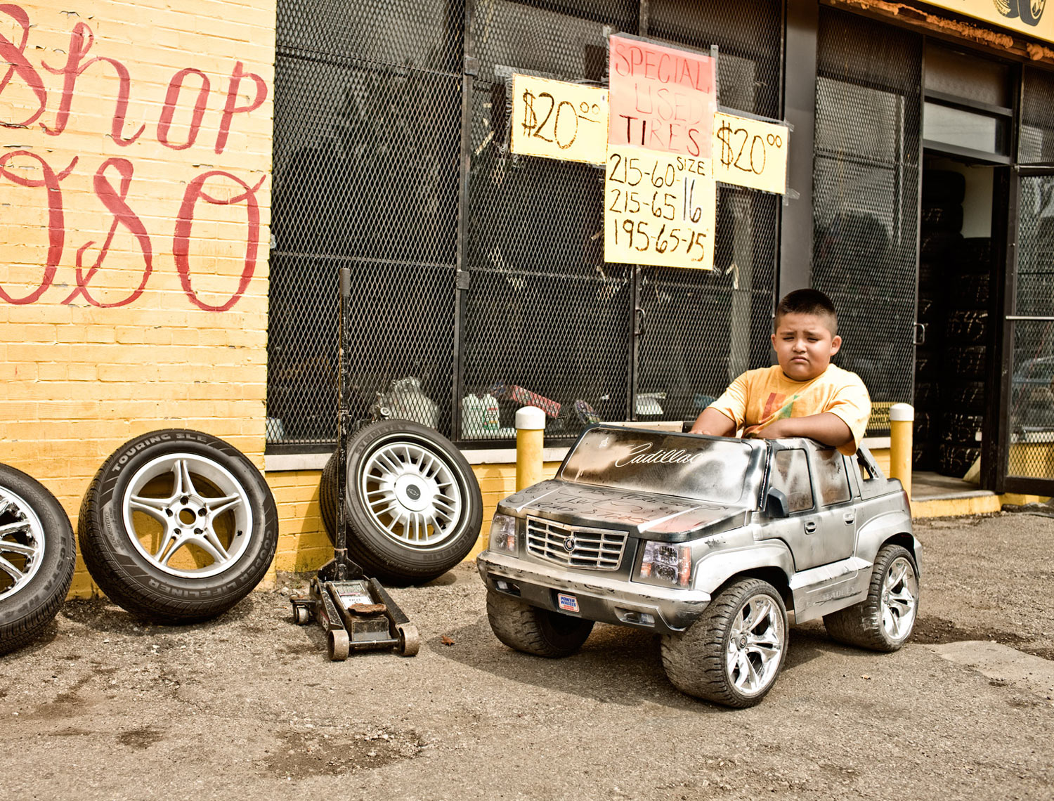 Humorous picture of big boy in small toy car | Saverio Truglia