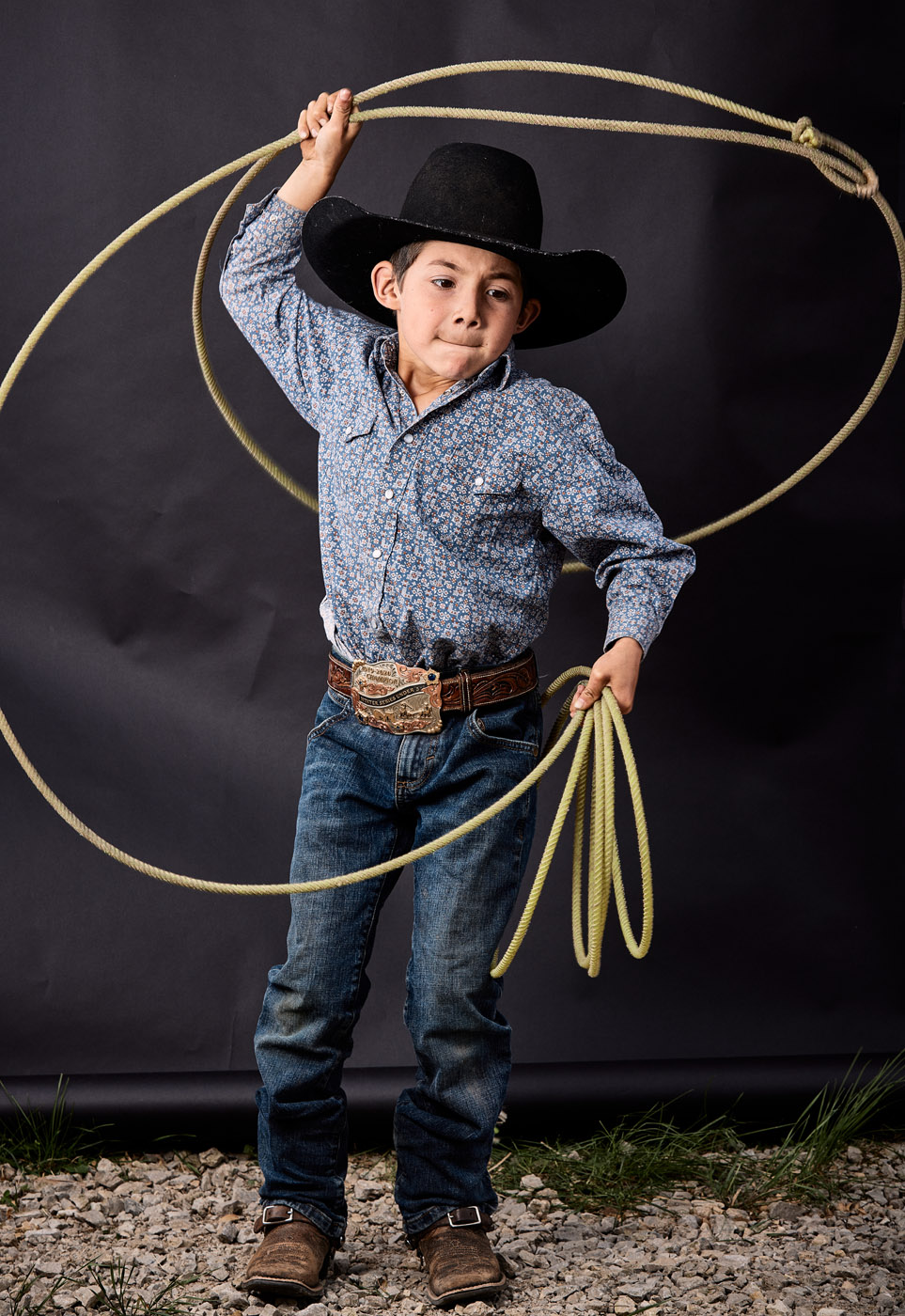 Latino boy roper at a rodeo | Childrens photography by Saverio Truglia