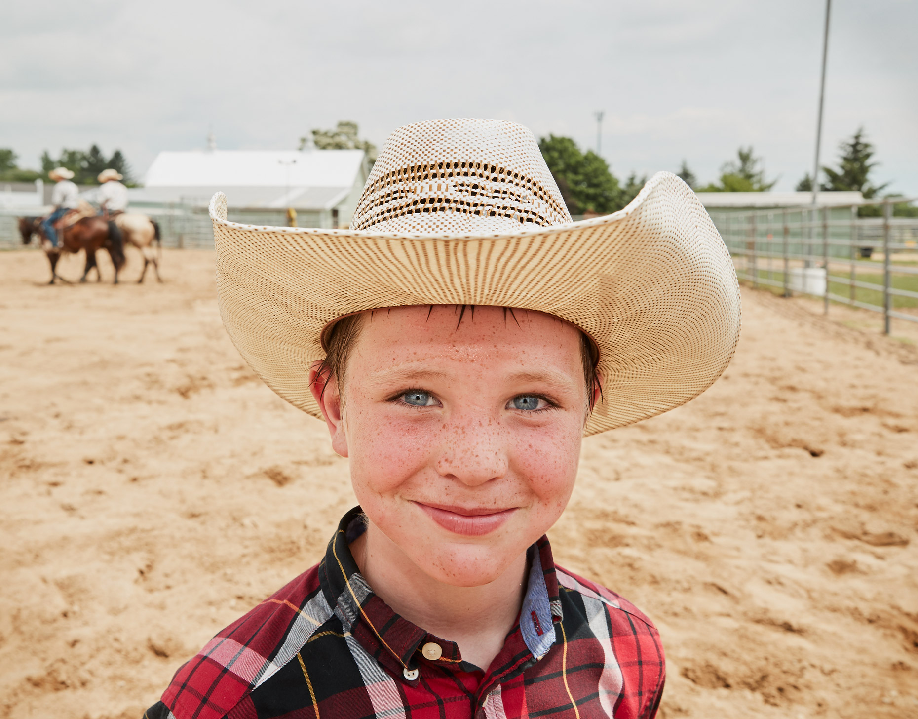 Freckled boy at rodeo | Childrens photography by Saverio Truglia