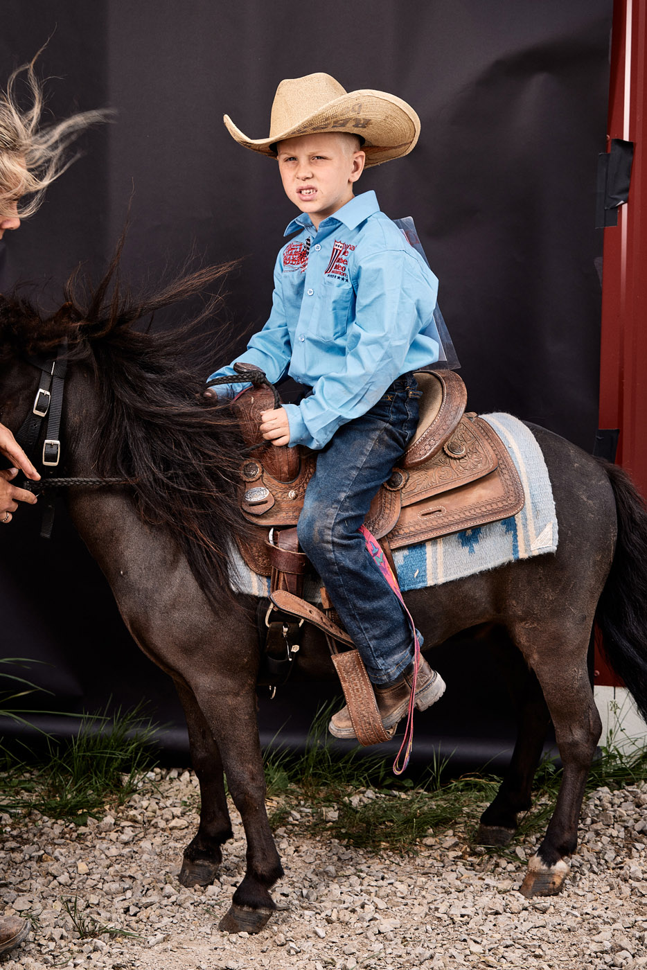 Boy sitting atop his pony | Childrens photography by Saverio Truglia