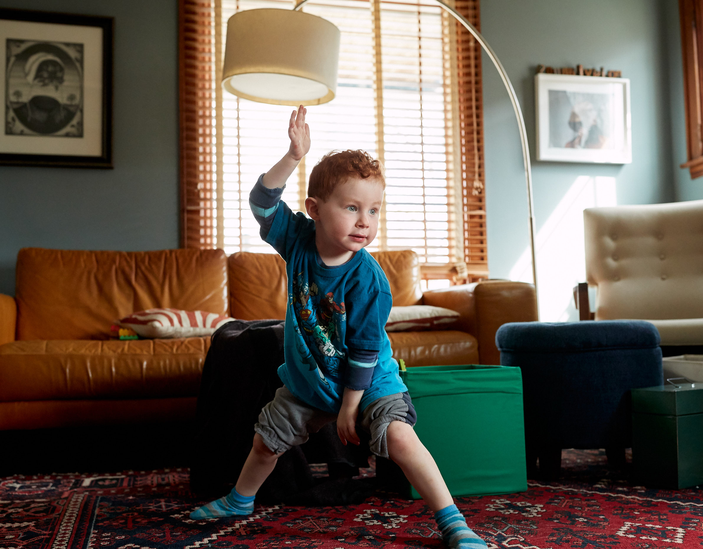 Small child doing yoga at home | Childrens photography by Saverio Truglia