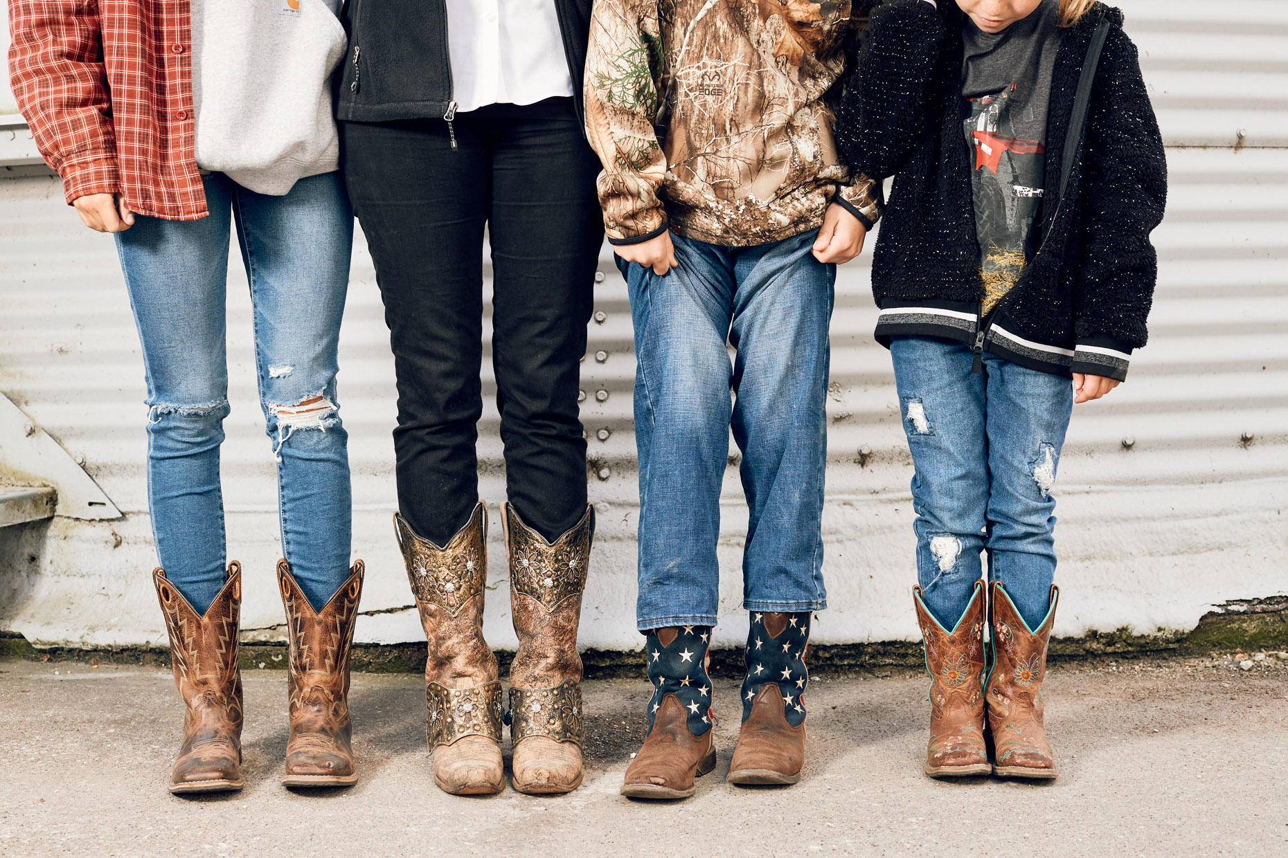 Family wearing cowboy boots | lifestyle photography by Saverio Truglia