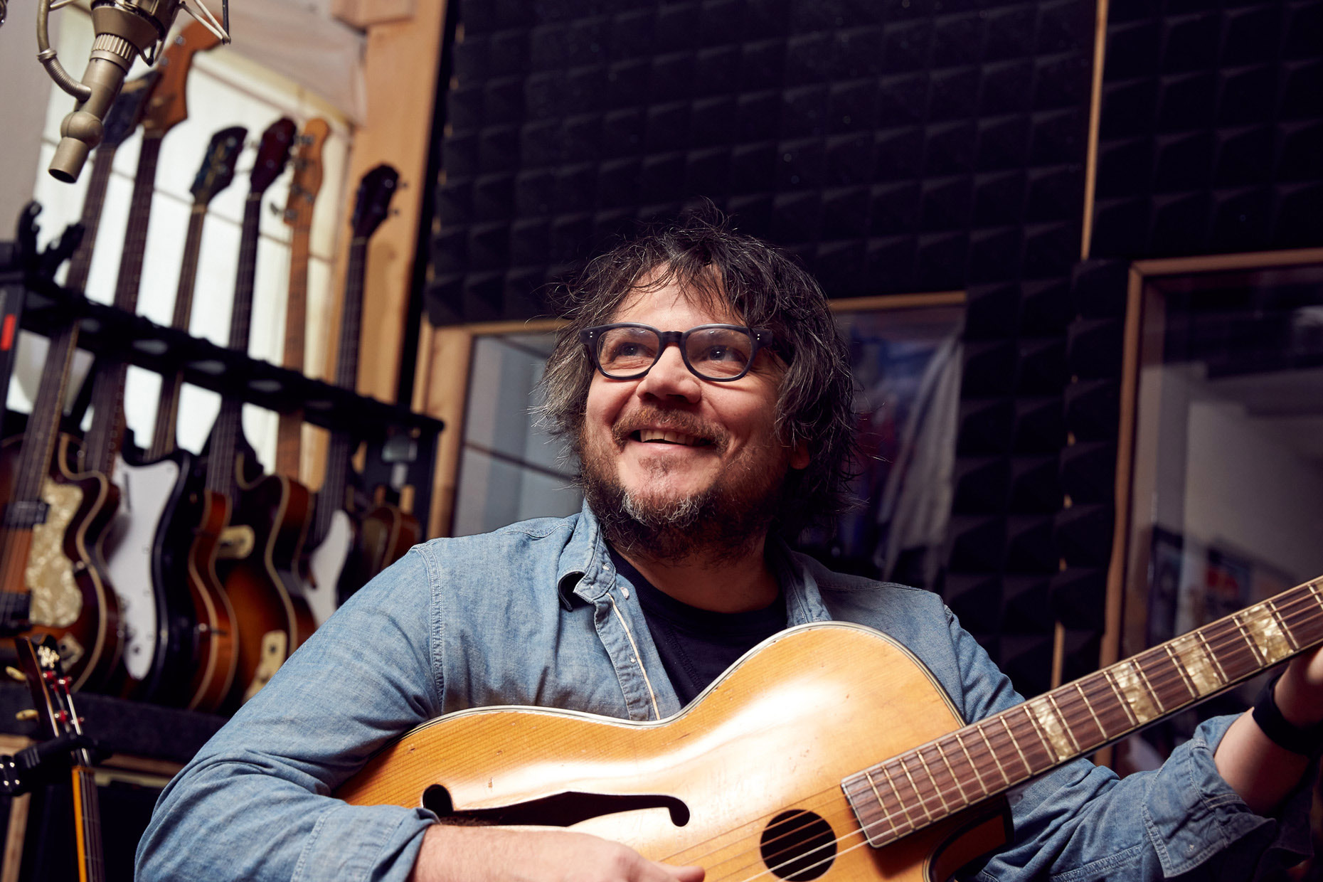 Jeff Tweedy of Wilco playing guitar in studio | lifestyle photography by Saverio Truglia