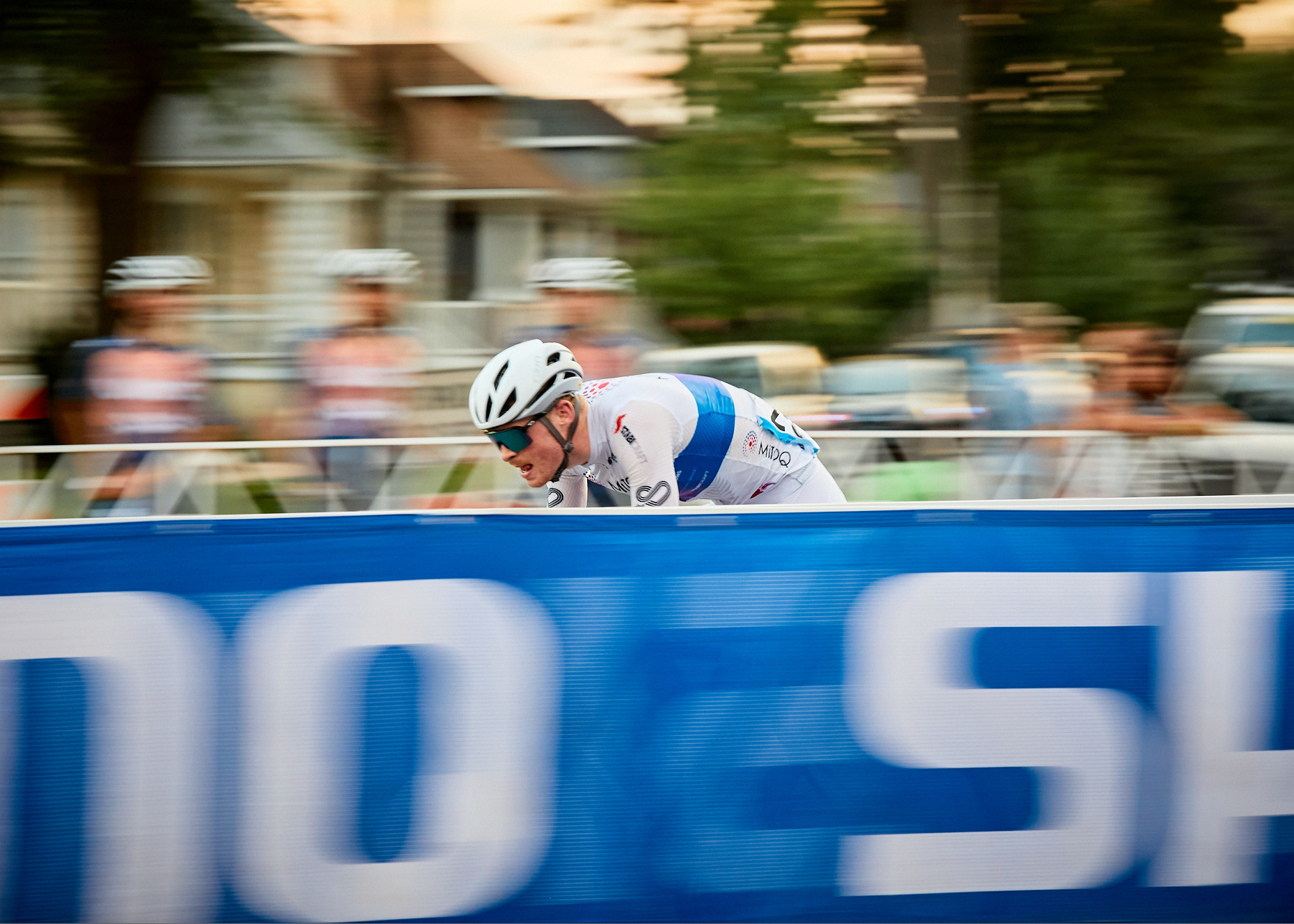 Bicycle racer blurring at high speed | Sports and Lifestyle photography by Saverio Truglia
